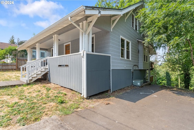 view of home's exterior with a porch