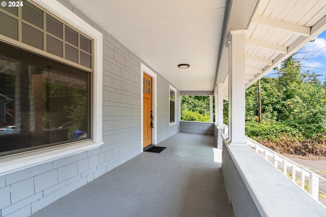 view of patio featuring a porch