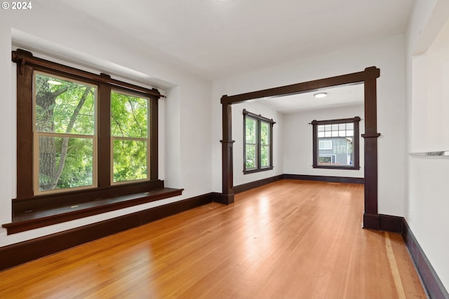 spare room featuring light hardwood / wood-style floors