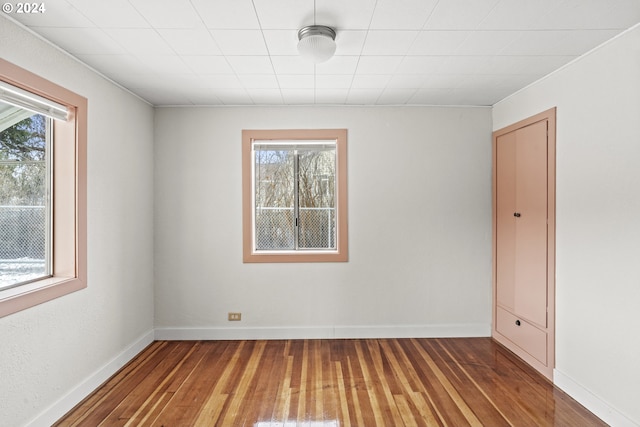5851 Wocus Rd, Klamath Falls, OR 97601 - spare room featuring plenty of natural light, hardwood / wood-style flooring, and baseboards
