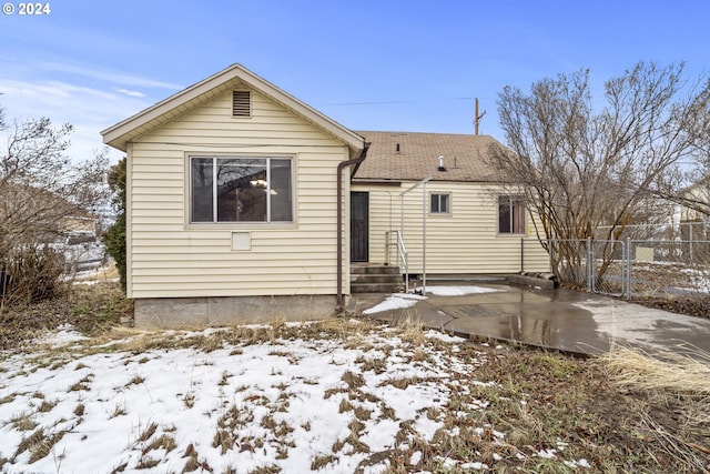 view of snow covered property