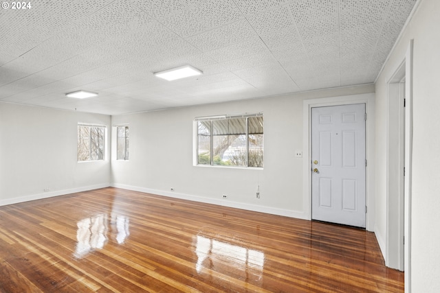 interior space with hardwood / wood-style flooring