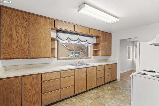 5851 Wocus Rd, Klamath Falls, OR 97601 - kitchen featuring a sink, white appliances, light countertops, and open shelves