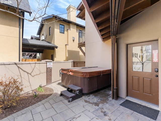1506 NW Awbrey Rd, Bend, OR 97703 - view of patio featuring a hot tub