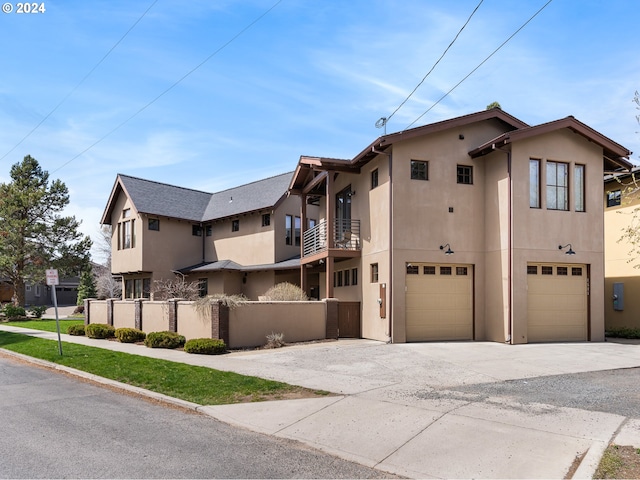 1506 NW Awbrey Rd, Bend, OR 97703 - view of front of house with a balcony and a garage