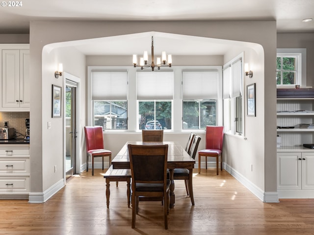 1506 NW Awbrey Rd, Bend, OR 97703 - dining space featuring light hardwood / wood-style flooring and a chandelier