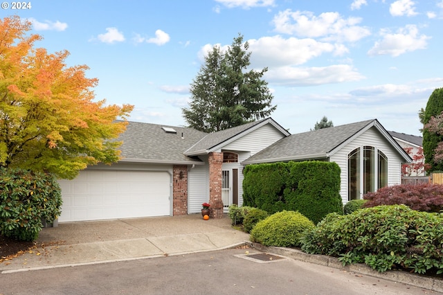 ranch-style home with a garage