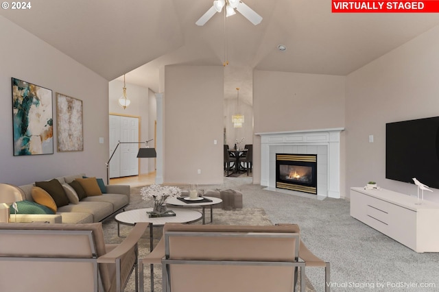 living room with light carpet, high vaulted ceiling, a fireplace, and ceiling fan