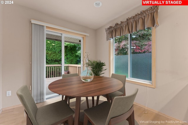 dining area with light wood-type flooring