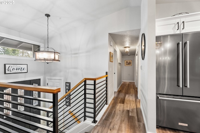 corridor featuring hardwood / wood-style floors