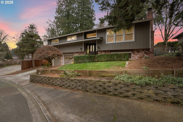 split foyer home featuring a garage