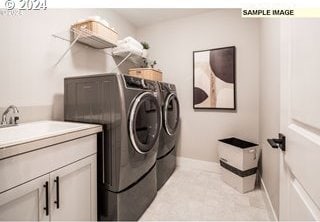 washroom featuring sink, light colored carpet, and washing machine and clothes dryer