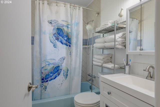 full bathroom with shower / bath combo, toilet, and vanity