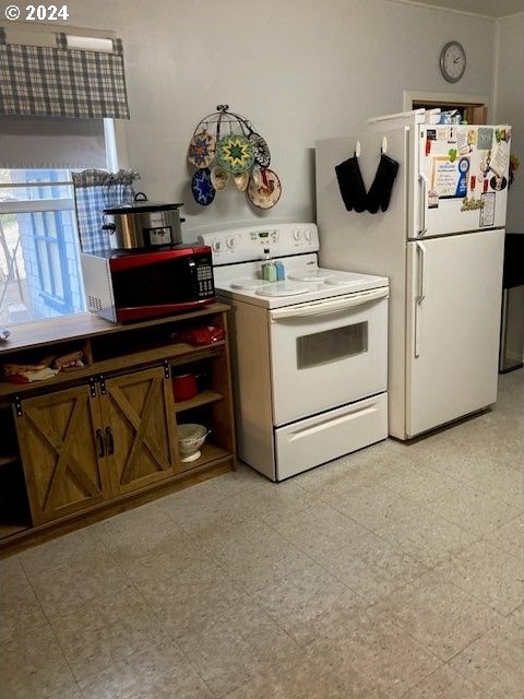 kitchen featuring white appliances