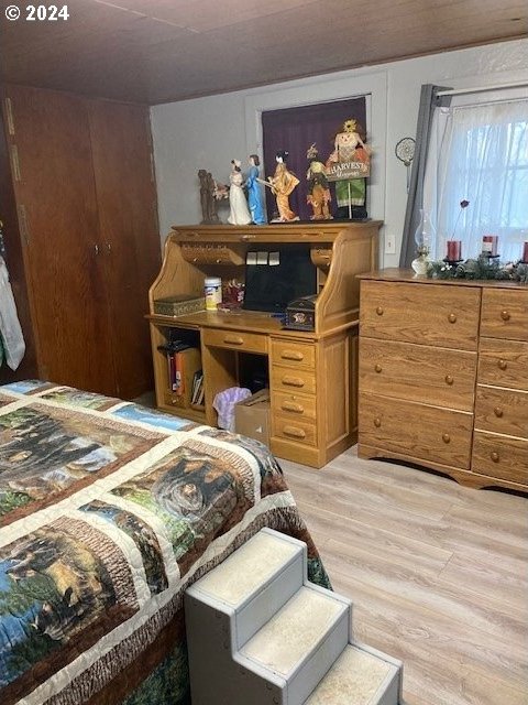 bedroom with light hardwood / wood-style flooring