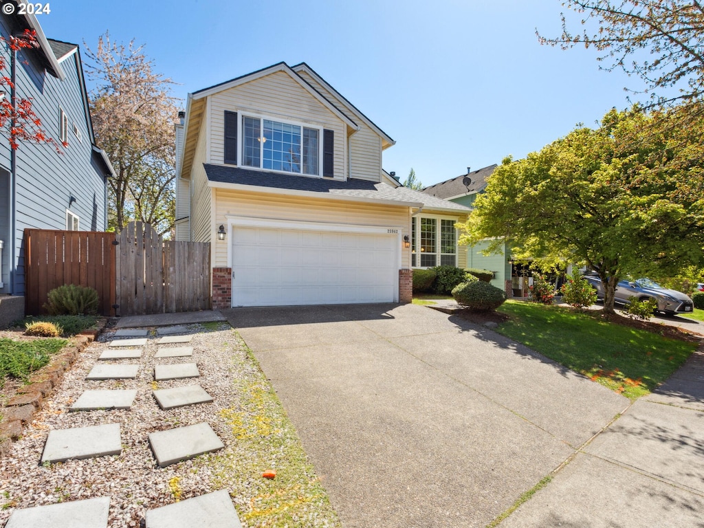 front of property with a garage