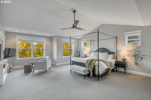 carpeted bedroom featuring ceiling fan and lofted ceiling