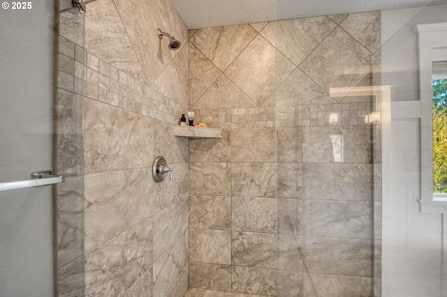 bathroom featuring a shower with door