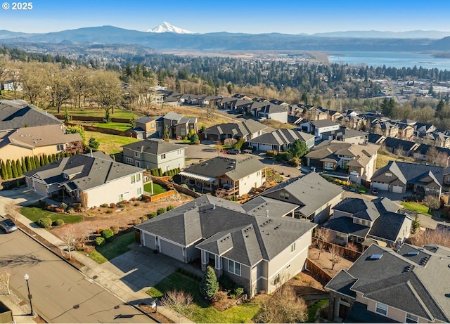 bird's eye view featuring a residential view and a mountain view