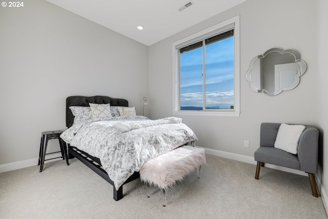 bedroom featuring visible vents, recessed lighting, baseboards, light colored carpet, and vaulted ceiling