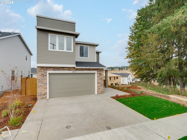 view of front of home with a garage