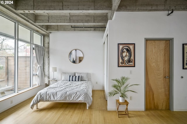 bedroom featuring wood-type flooring