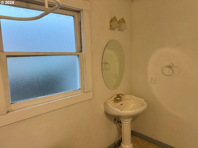 300 N River St, Enterprise, OR 97828 - bathroom with baseboards and a sink