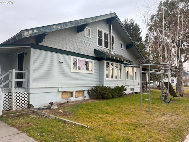 view of home's exterior featuring a lawn