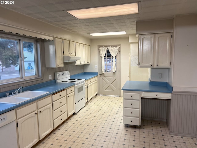 kitchen featuring white appliances and sink