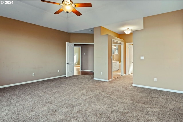 carpeted empty room featuring ceiling fan