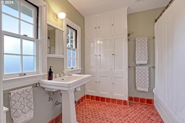 bathroom with plenty of natural light