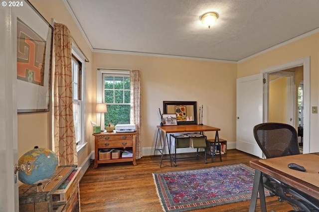 office area with dark wood-type flooring and ornamental molding