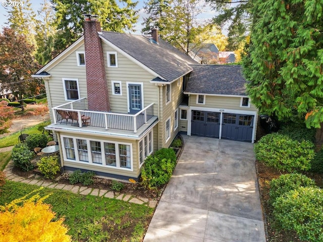 view of front of home featuring a balcony