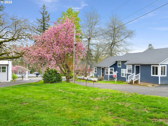 view of yard with a garage