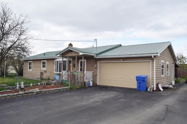 single story home with a garage