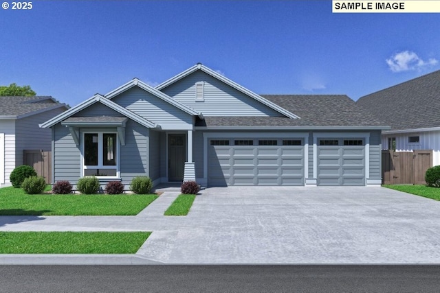 view of front of house featuring a garage and a front yard