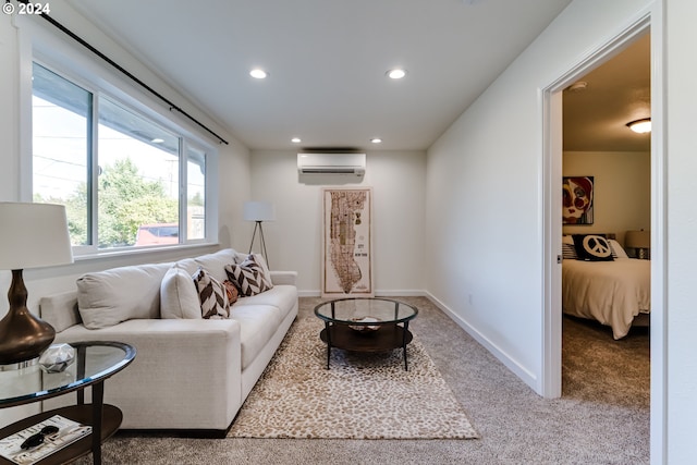 living room with a wall mounted AC and light colored carpet