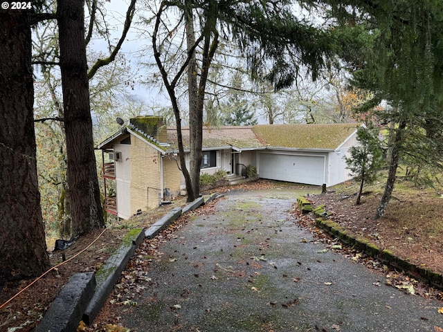 view of front of home with a garage