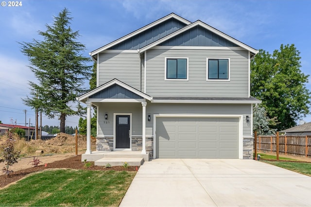 craftsman inspired home with a garage