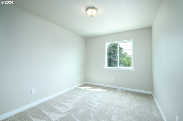 empty room with carpet floors