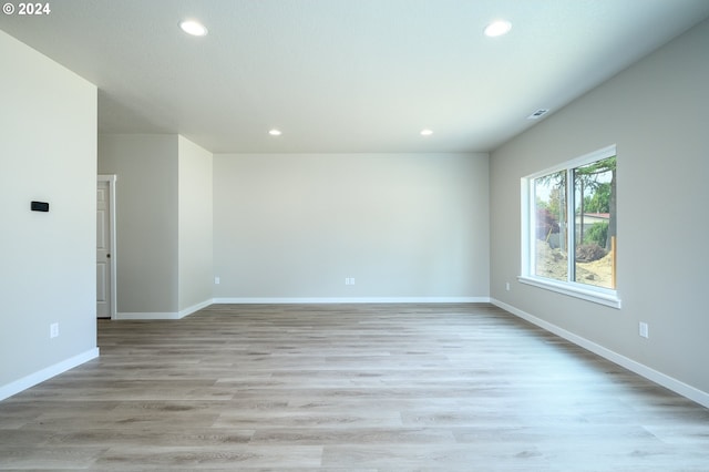 empty room featuring light hardwood / wood-style floors