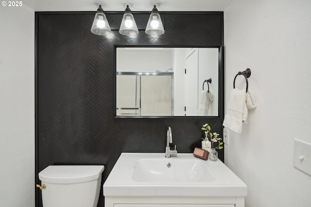 bathroom with toilet and sink