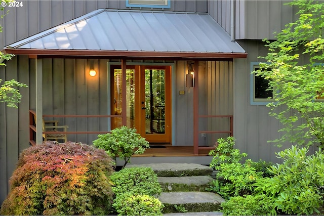 6733 NW Cornell Rd, Portland, OR 97229 - doorway to property with a standing seam roof, metal roof, and board and batten siding