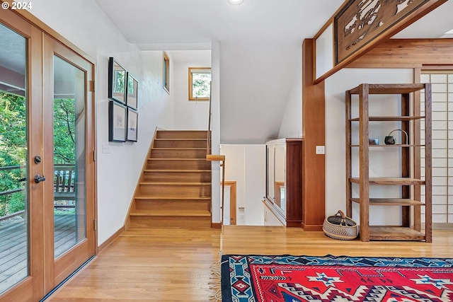 6733 NW Cornell Rd, Portland, OR 97229 - foyer entrance featuring healthy amount of natural light, wood finished floors, stairway, french doors, and recessed lighting