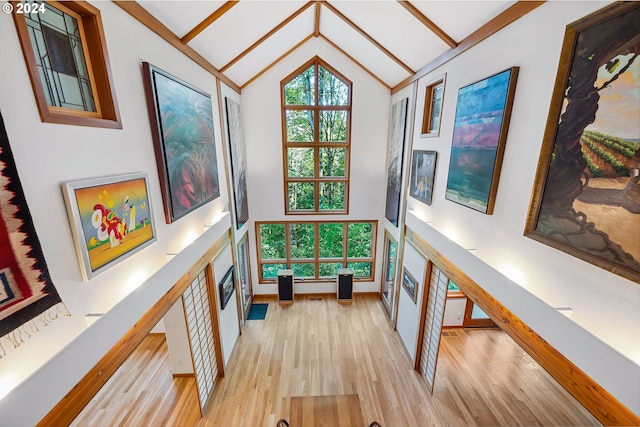6733 NW Cornell Rd, Portland, OR 97229 - hallway with light wood-style floors, high vaulted ceiling, and beam ceiling