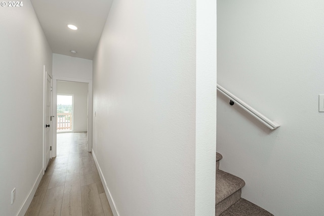 corridor featuring light hardwood / wood-style floors