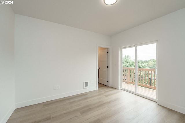 empty room with light wood-type flooring