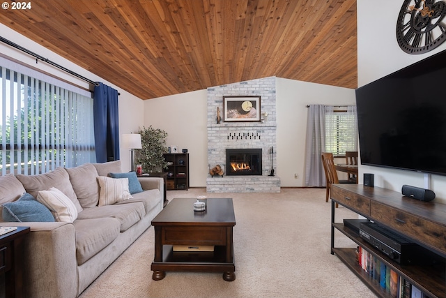 living room featuring wooden ceiling, vaulted ceiling, and plenty of natural light