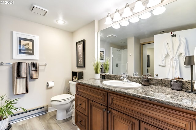 bathroom with hardwood / wood-style flooring, toilet, a shower with shower door, vanity, and baseboard heating