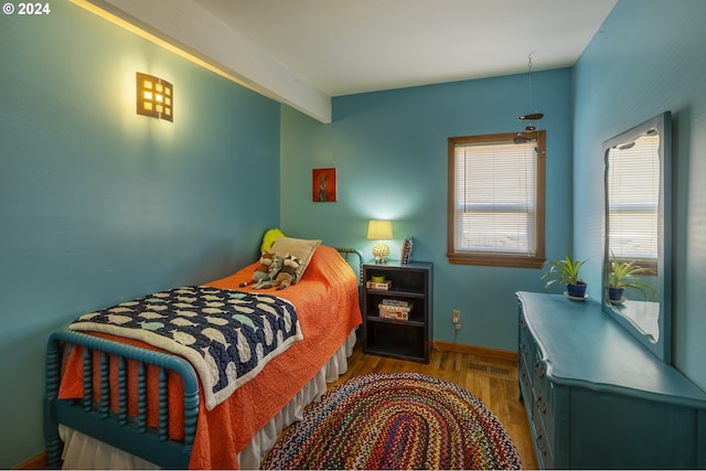 bedroom featuring wood-type flooring